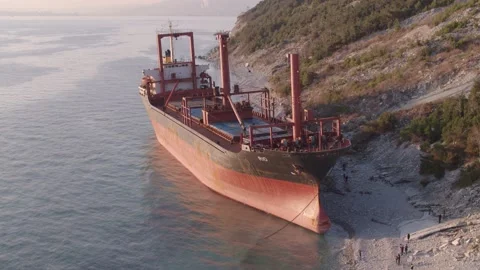 The ship ran aground. Environmental pollution at sea. Aerial view. grounded ship Stock Footage 137655261