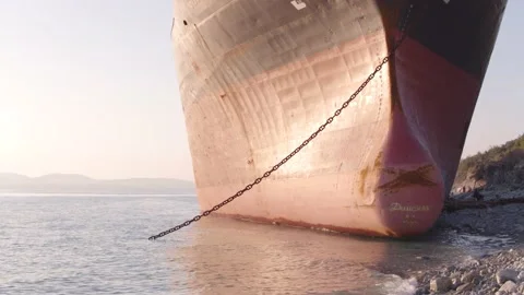 The ship ran aground. Environmental pollution at sea. Aerial view. grounded ship Stock Footage 137655469