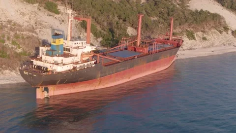 The ship ran aground. Environmental pollution at sea. Aerial view. grounded ship Stock Footage 137655554