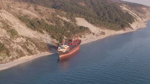 The ship ran aground. Environmental pollution at sea. Aerial view. grounded ship Stock Footage 137655693