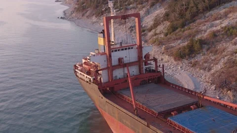 The ship ran aground. Environmental pollution at sea. Aerial view. grounded ship Stock Footage 137656116