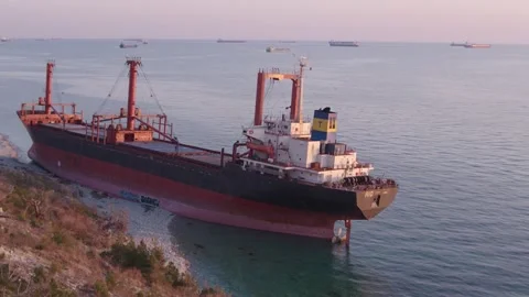The ship ran aground. Environmental pollution at sea. Aerial view. grounded ship Stock Footage 137656208