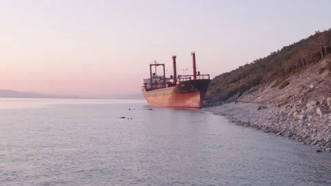 The ship ran aground. Environmental pollution at sea. Aerial view. grounded ship Stock Footage 137656359
