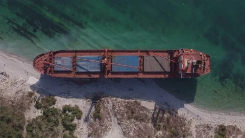 The ship ran aground. Environmental pollution at sea. Aerial view. grounded ship Stock Footage 138834155