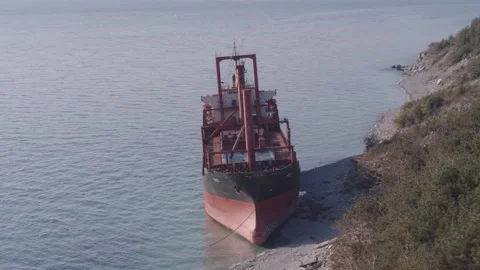 The ship ran aground. Environmental pollution at sea. Aerial view. grounded ship Stock Footage 138834188