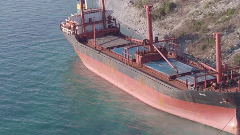The ship ran aground. Environmental pollution at sea. Aerial view. grounded ship Stock Footage 138834336