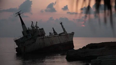 A ship that ran aground at sunset Stock Footage 170755188