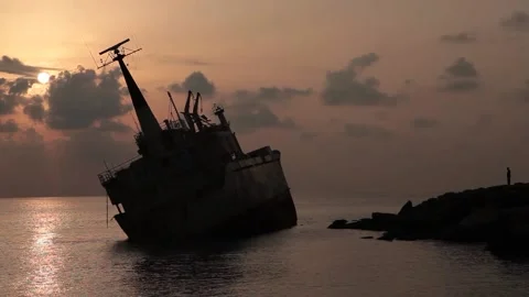 A ship that ran aground at sunset Stock Footage 170755305