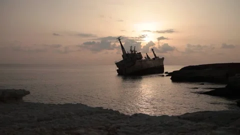 A ship that ran aground at sunset Stock Footage 170755386