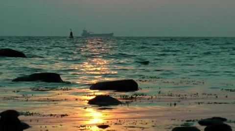 Ship returning to the harbour during sunset Stock Footage 62605987