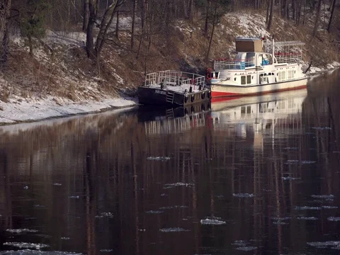 Ship in the river and Floes passing by Stock Footage 72950631