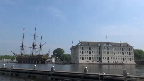 Ship on a river with a Holland flag Stock Footage 94925283