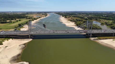 Ship on the river Waal during summer drought seen from above Stock Footage 342111033