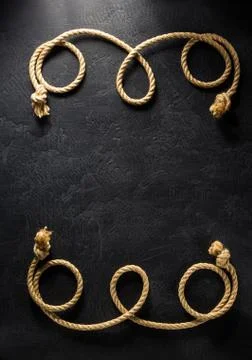 Ship rope at black Stock Photos