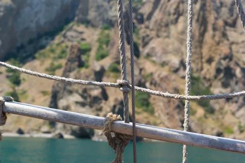 Ship ropes on a background of mountains Foto stock
