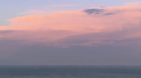 A ship sailing along the shore under an orange sky, Stock Footage 39483754