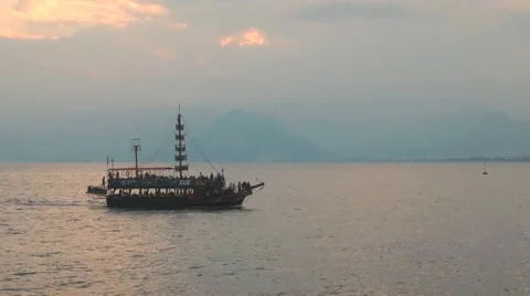 Ship sailing away against  sunset Video stock 49303624