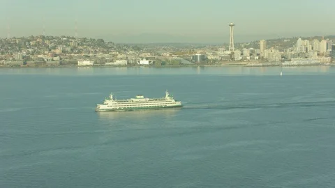 Ship sailing in sea with background view of cityscape Stock Footage 99818093