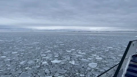 Ship sailing through big chunks of ice Stock Footage 281849868