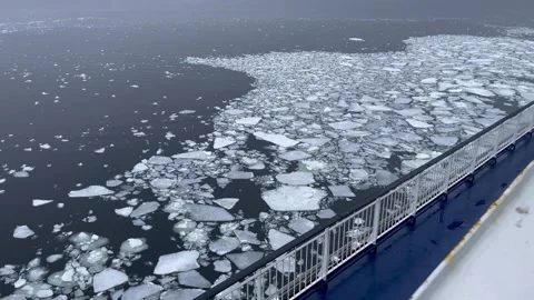 Ship sailing through big chunks of ice Stock Footage 281852482
