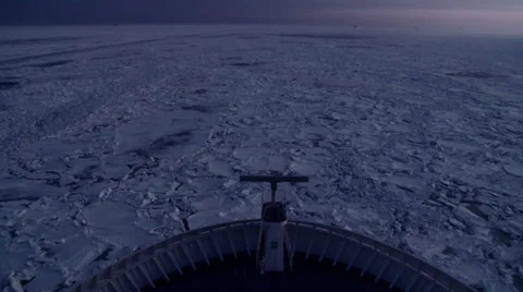 Ship sailing through ice Stock Footage 34318850