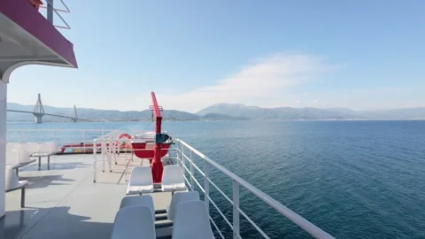 Ship sailing through narrow passage near Rio Antirrio bridge in Greece 스톡 동영상 317295583