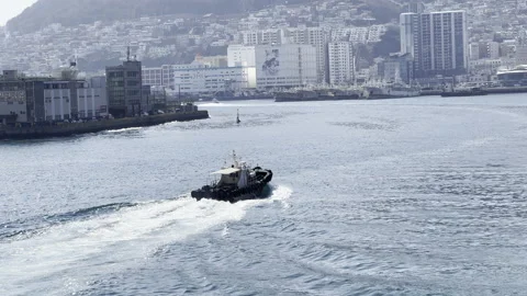 A ship sailing through the seas of Yeongdo, Busan, South Korea Stock Footage 171845524