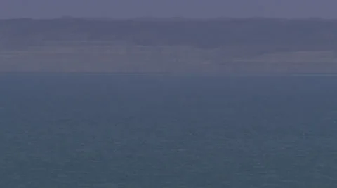 A ship sailing into view of the camera on a calm sea, Video stock 39483865