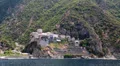 Ship sails along peninsula of Athos, autonomous monastic state in Greece HD Footage