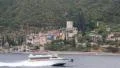Ship sails along peninsula of Athos, autonomous monastic state in Greece HD Footage