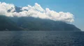 Ship sails along peninsula of Athos, autonomous monastic state in Greece HD Footage