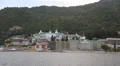Ship sails along peninsula of Athos, autonomous monastic state in Greece HD Footage