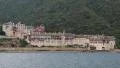 Ship sails along peninsula of Athos, autonomous monastic state in Greece HD Footage