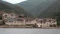 Ship sails along peninsula of Athos, autonomous monastic state in Greece HD Footage