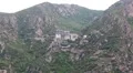 Ship sails along peninsula of Athos, autonomous monastic state in Greece HD Footage