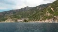 Ship sails along peninsula of Athos, autonomous monastic state, Greece HD Footage