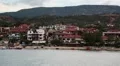 Ship sails along peninsula of Athos, autonomous monastic state, Greece HD Footage