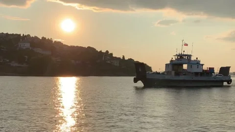 The ship sails along the river against the backdrop of the shore and a beaut Stock Footage 219376567
