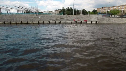 The ship sails along the shore, the view from the ship Stock Footage 77764087