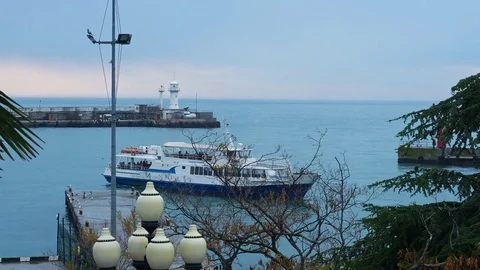 The ship sails away from the pier and goes to sea Stock Footage 84730677