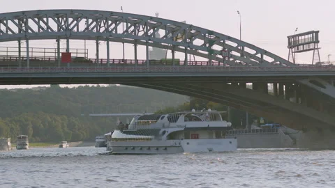 The ship sails in the city river under the bridge Stock Footage 164058615