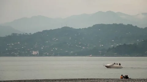 Ship sails on mountain view and two people 動画素材 44118457