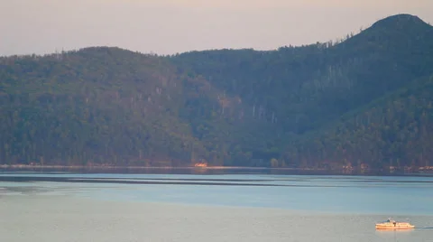 Ship sails past the mountains Stock Footage 51553807