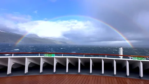 A Ship Sails Through the Beagle Channel from Ushuaia in Argentina towards the Stock Footage 345257853