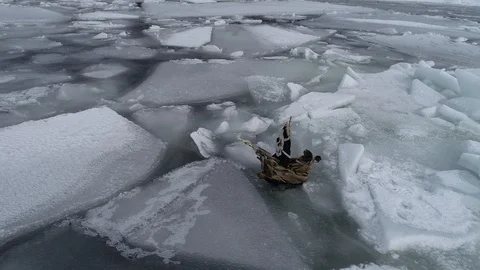The ship sails through the sea ice in the winter. child pirate ship in ice. Stock Footage 87858447