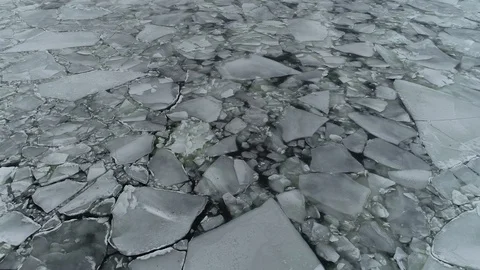 The ship sails through the sea ice in the winter. child pirate ship in ice. Stock Footage 87859154