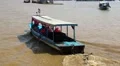 Ship sails to the Tonle Sap lake in Siem Reap province, Cambodia HD Footage
