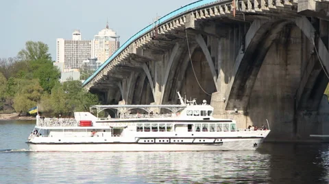 Ship Sails Under A Bridge in Kyiv Stock Footage 37735194