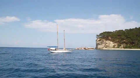 Ship in sea. Rocks. Clouds. 動画素材 7747630