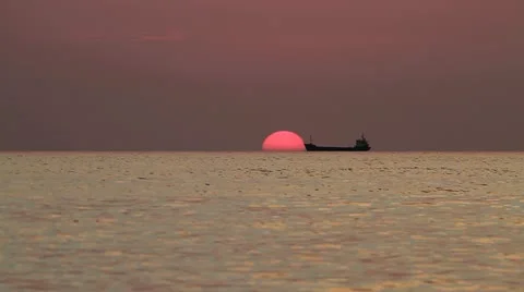 Ship on sea sunset background Видео 11399692